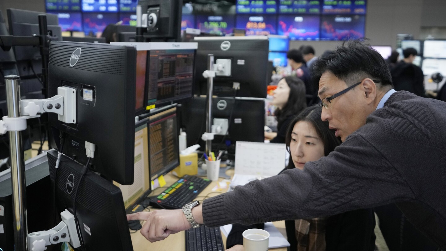 Stock market today: Asian shares mixed ahead of US consumer confidence and price data #Stock #market #today #Asian #shares #mixed #ahead #consumer #confidence #price #data